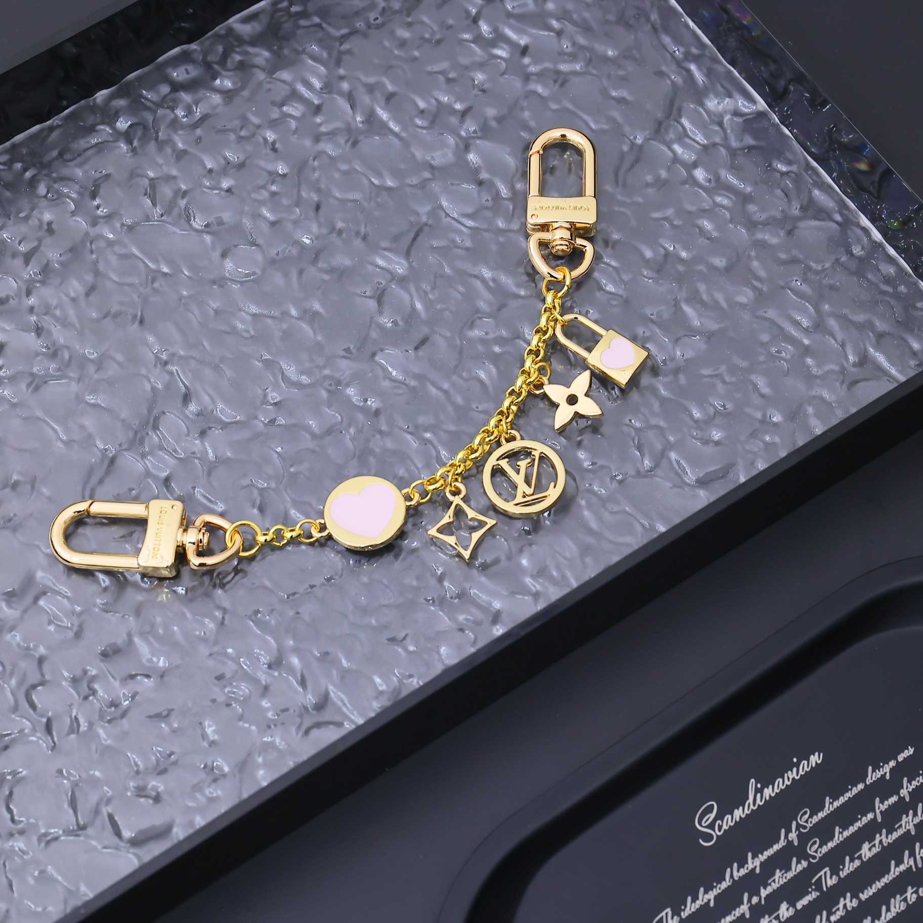 Louis Vuitton LV Iconic Heart Bag Charm    M01421 - FashionPlug