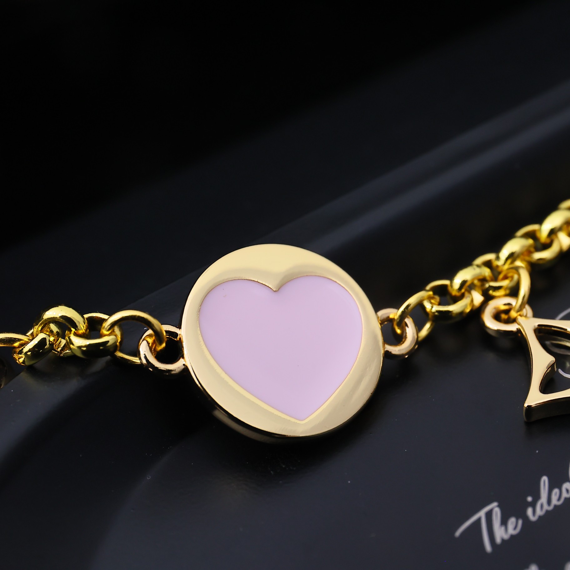 Louis Vuitton LV Iconic Heart Bag Charm    M01421 - FashionPlug