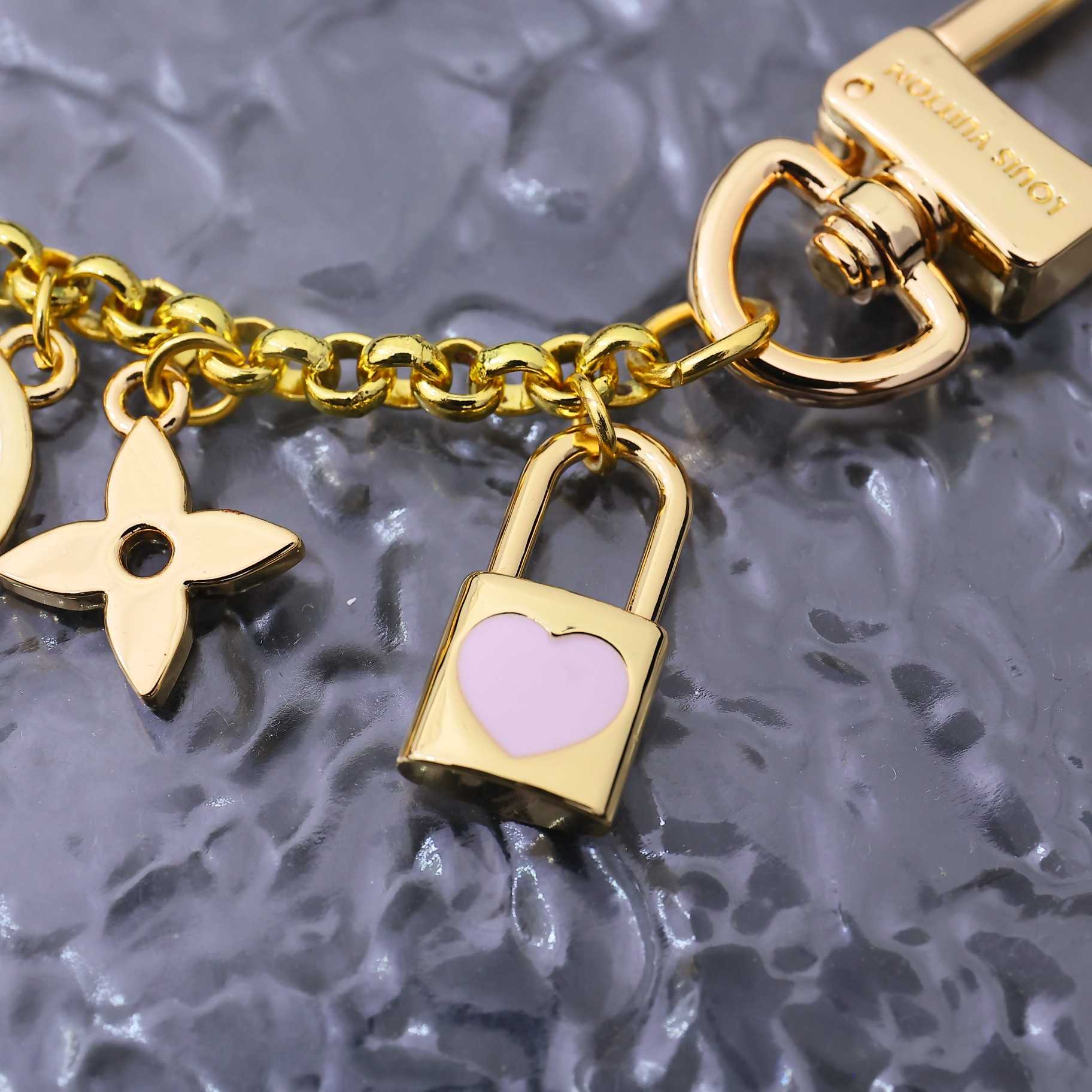 Louis Vuitton LV Iconic Heart Bag Charm    M01421 - FashionPlug