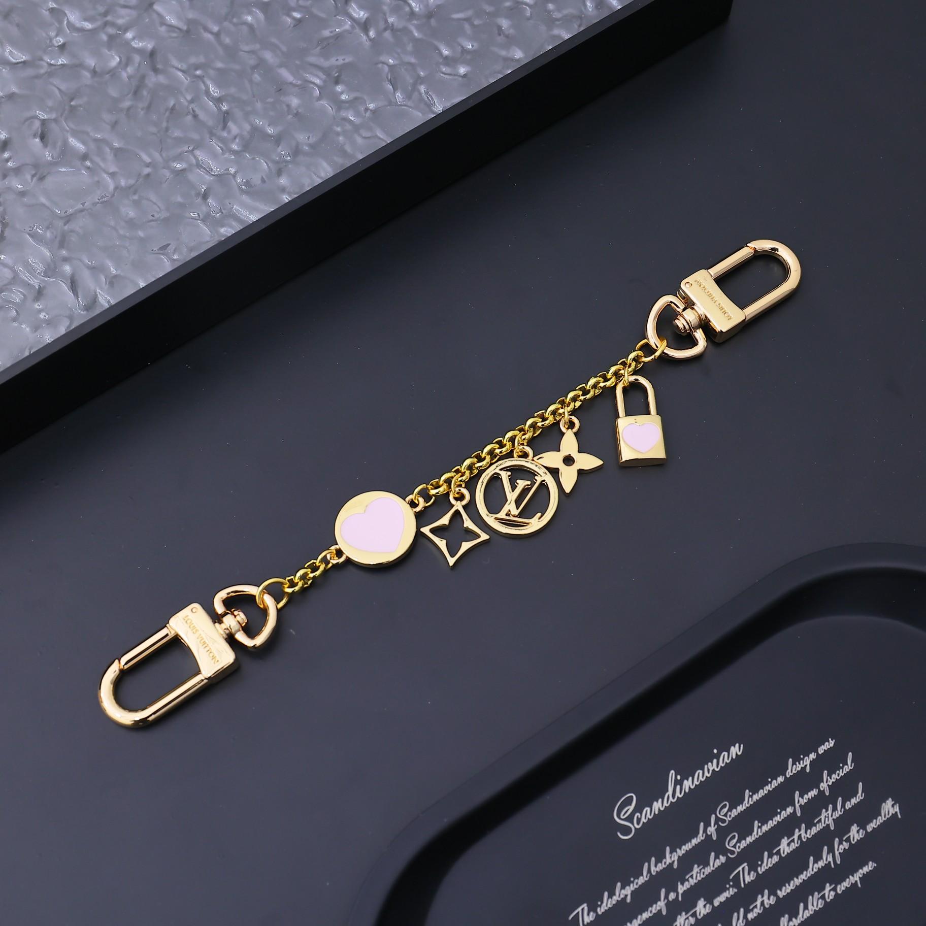 Louis Vuitton LV Iconic Heart Bag Charm    M01421 - FashionPlug