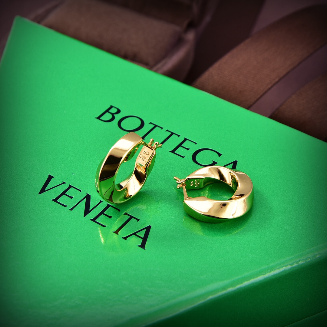 Bottega Veneta Twist Hoop Earrings - FashionPlug