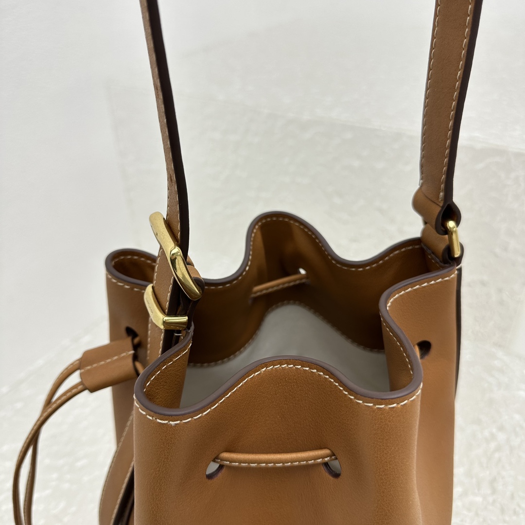 Miu Miu Leather Bucket Bag - FashionPlug