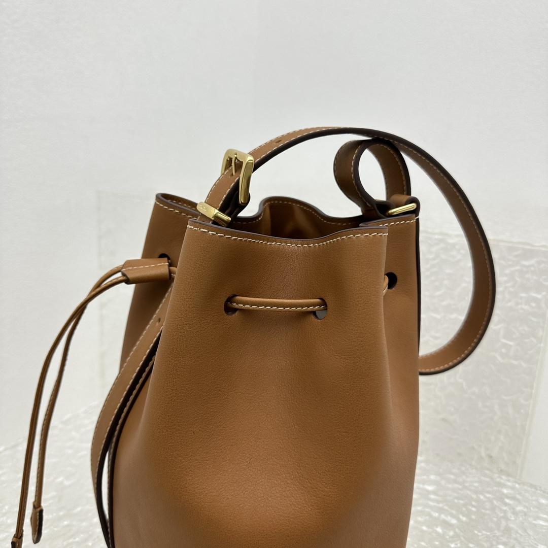 Miu Miu Leather Bucket Bag - FashionPlug