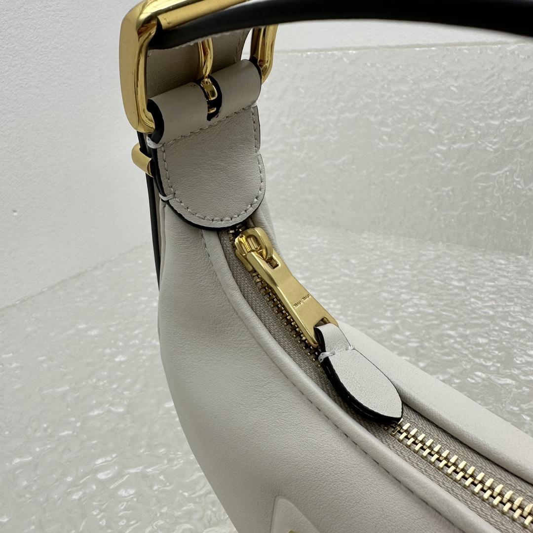 Miu Miu Leather Hobo Bag - FashionPlug