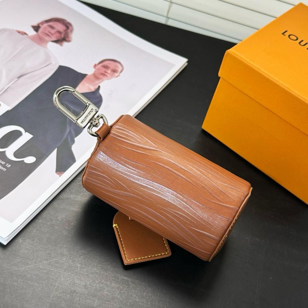 Louis Vuitton Soft Polochon Pouch Key Holder And Bag Charm      M01401 - FashionPlug