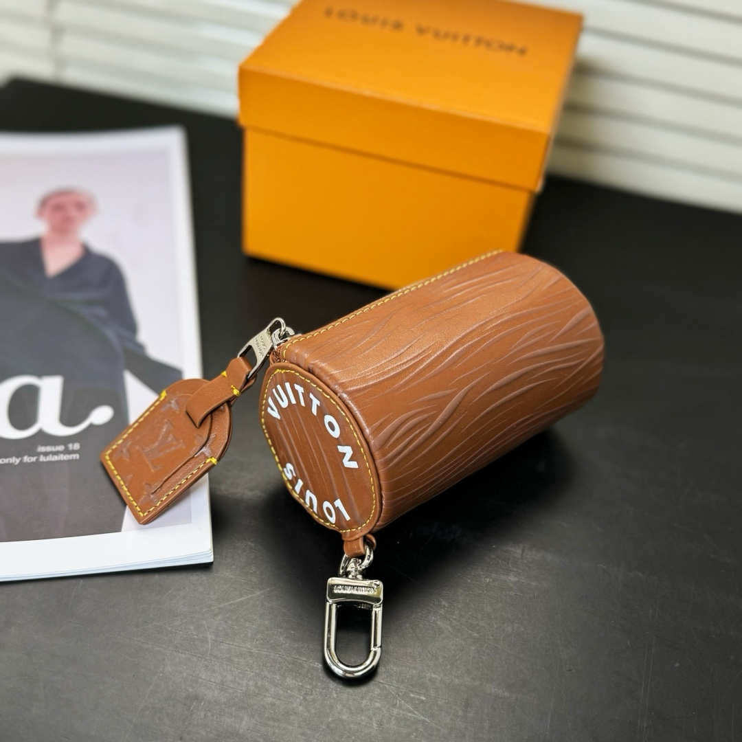 Louis Vuitton Soft Polochon Pouch Key Holder And Bag Charm      M01401 - FashionPlug