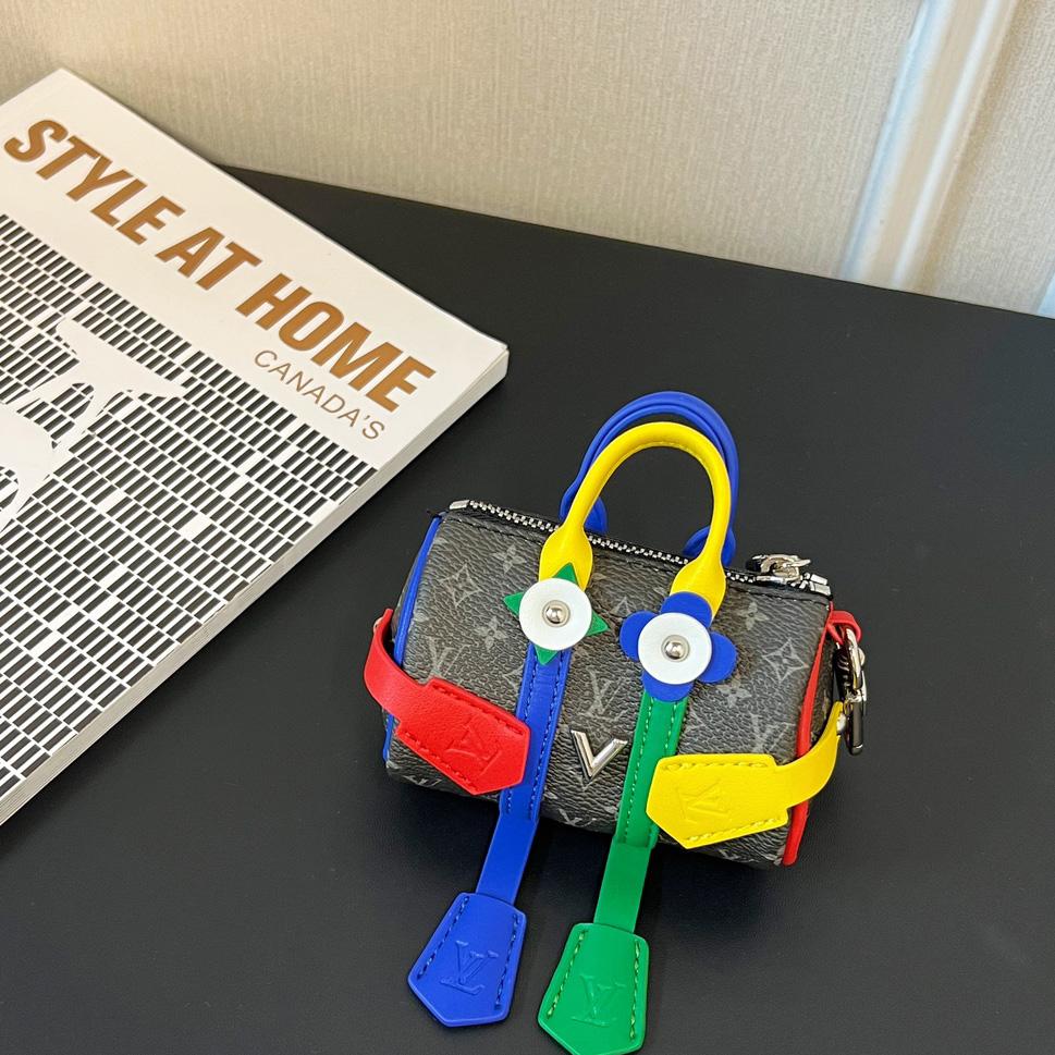 Louis Vuitton Mister Keepall Key Holder And Bag Charm    - FashionPlug