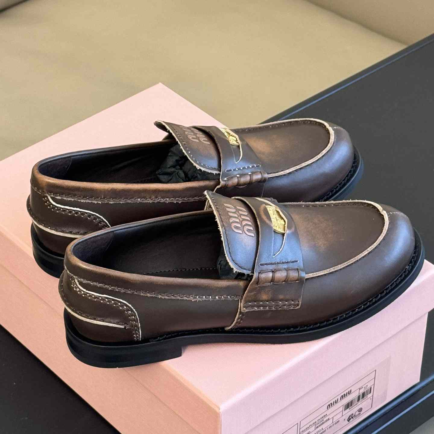 Miu Miu Vintage-effect Leather Penny Loafers - FashionPlug
