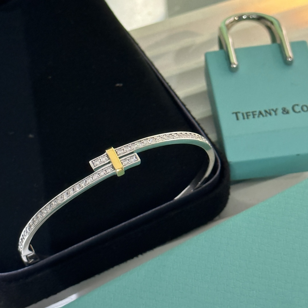 Tiffany & Co. Edge Hinged Bypass Bangle Bracelet - FashionPlug