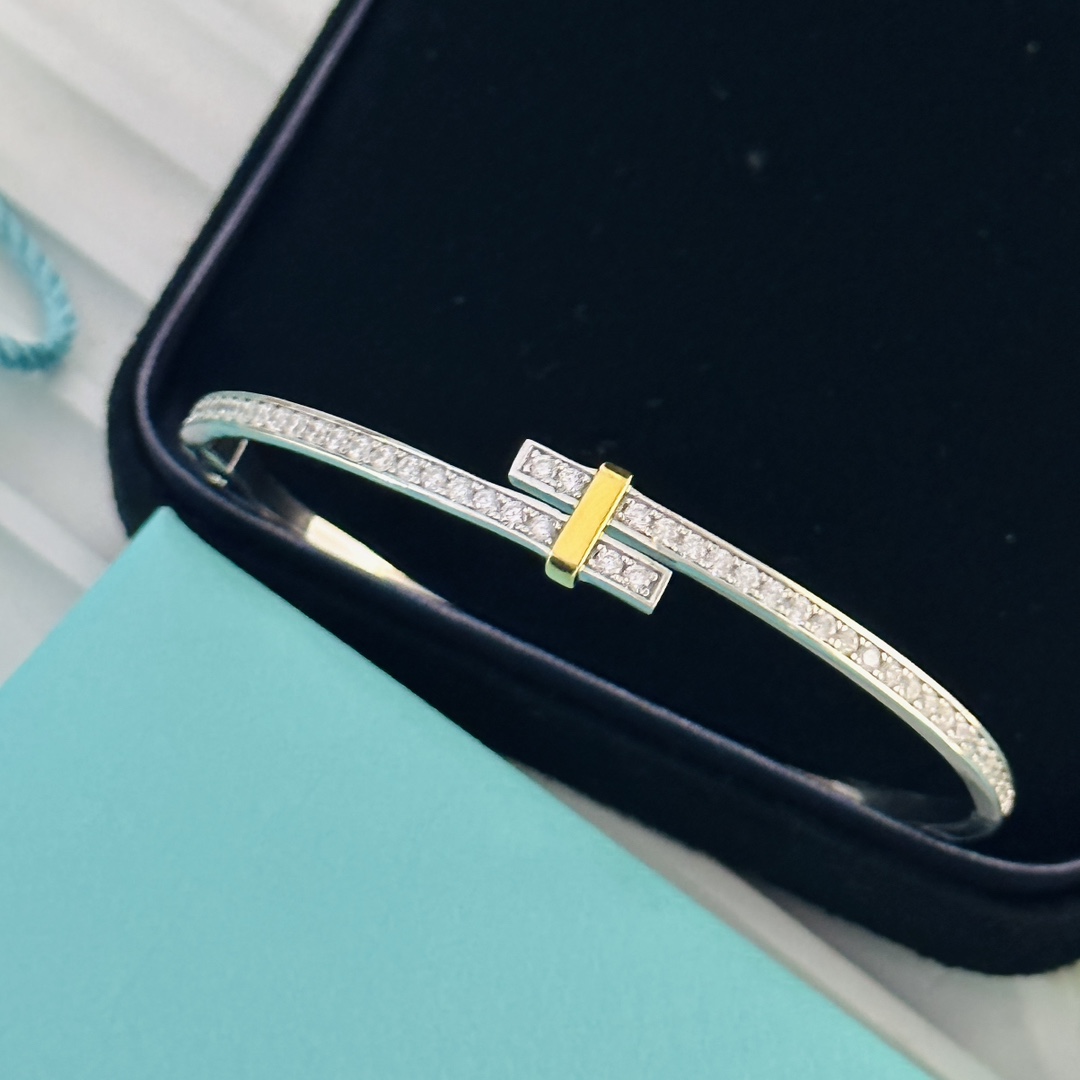 Tiffany & Co. Edge Hinged Bypass Bangle Bracelet - FashionPlug