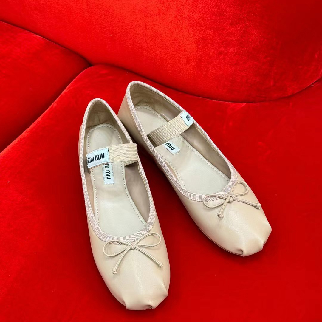 Miu Miu Leather Bow Ballerina Flats - FashionPlug