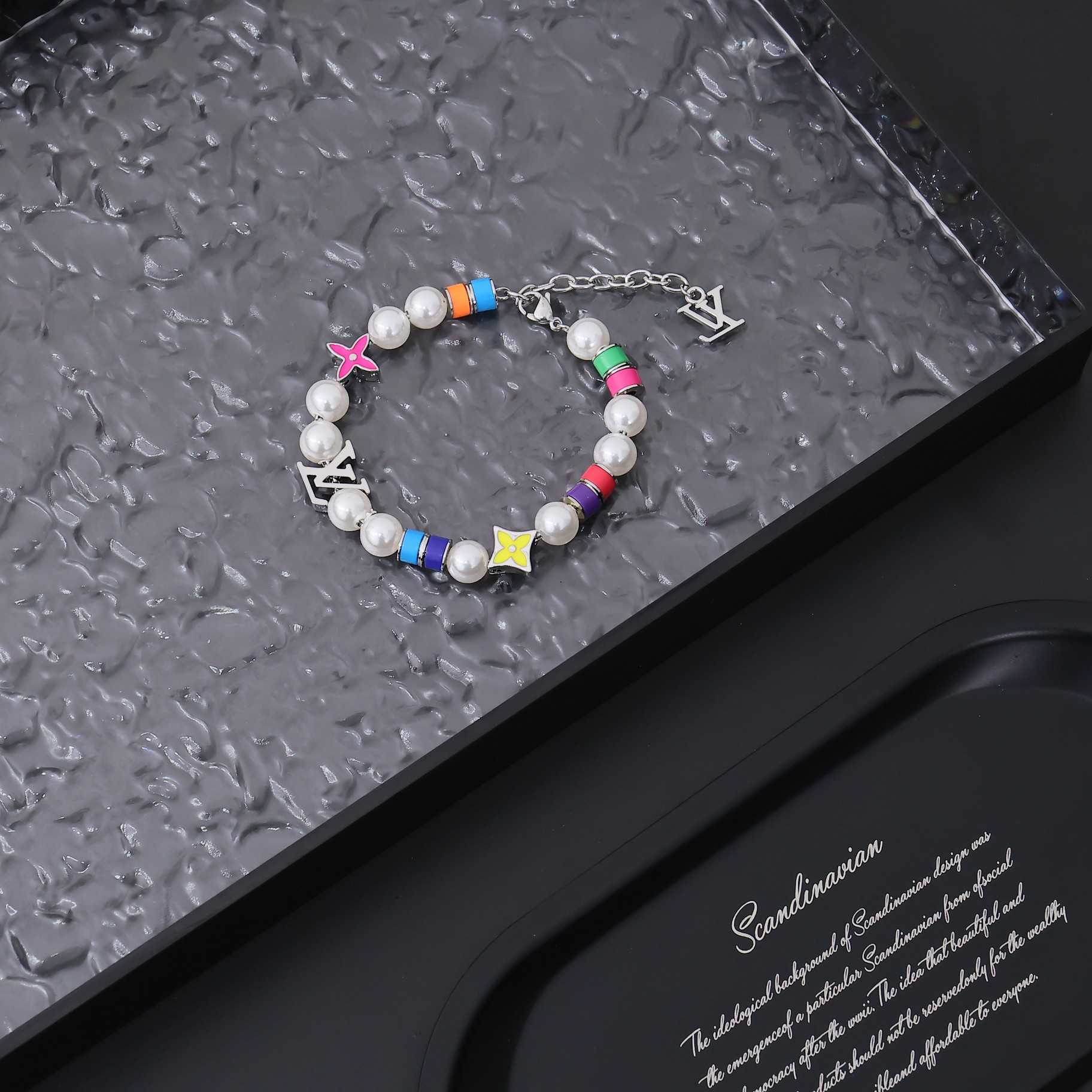 Louis Vuitton MNG Pearls Party Bracelet    M1264A - FashionPlug