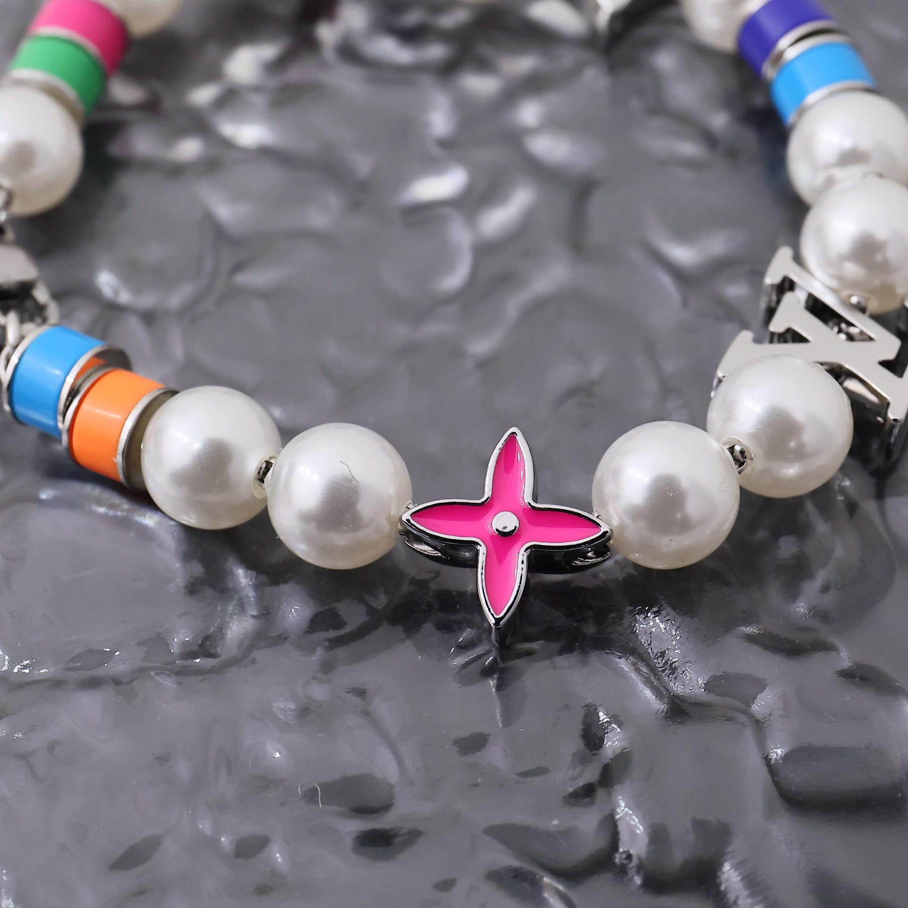 Louis Vuitton MNG Pearls Party Bracelet    M1264A - FashionPlug
