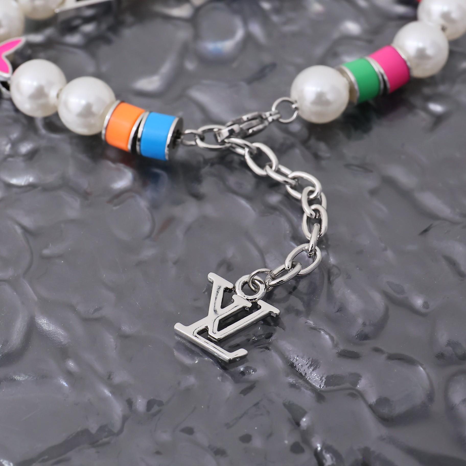 Louis Vuitton MNG Pearls Party Bracelet    M1264A - FashionPlug