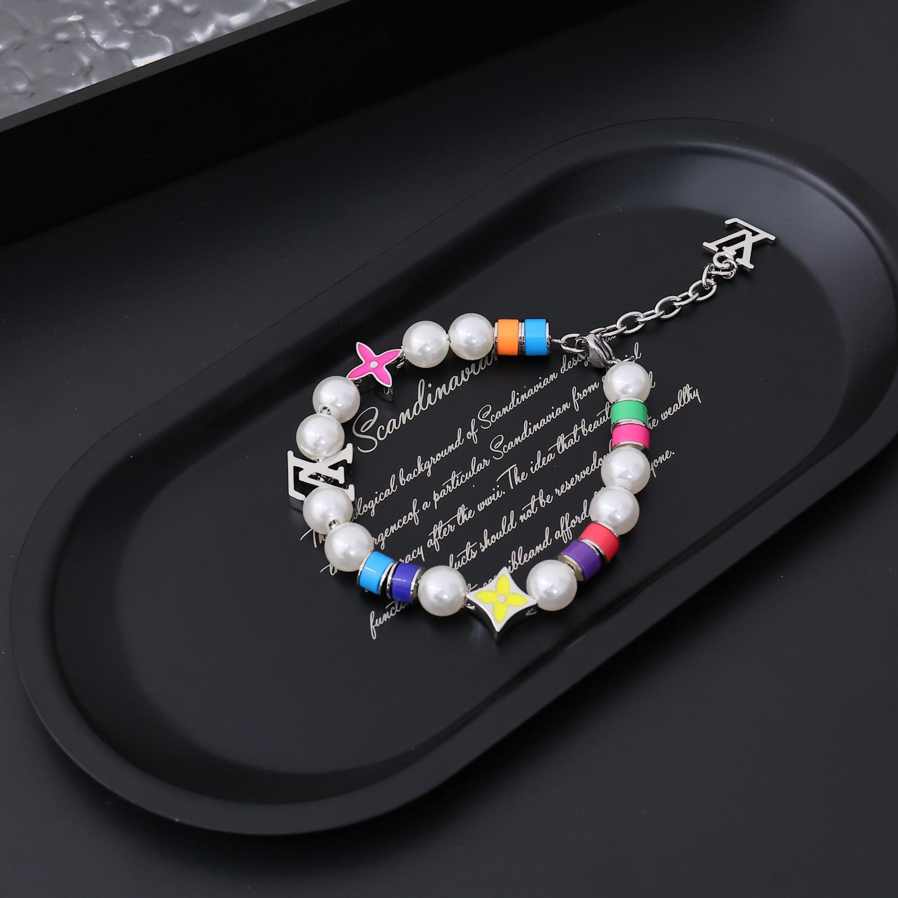 Louis Vuitton MNG Pearls Party Bracelet    M1264A - FashionPlug