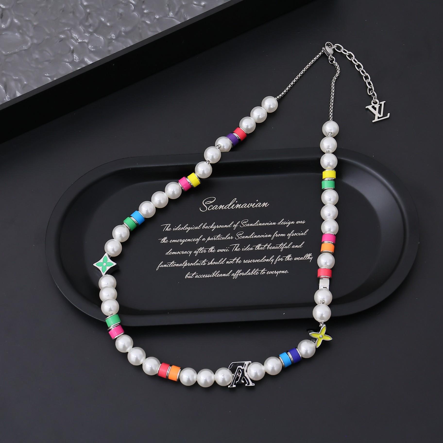 Louis Vuitton MNG Pearls Party Necklace   M01500 - FashionPlug