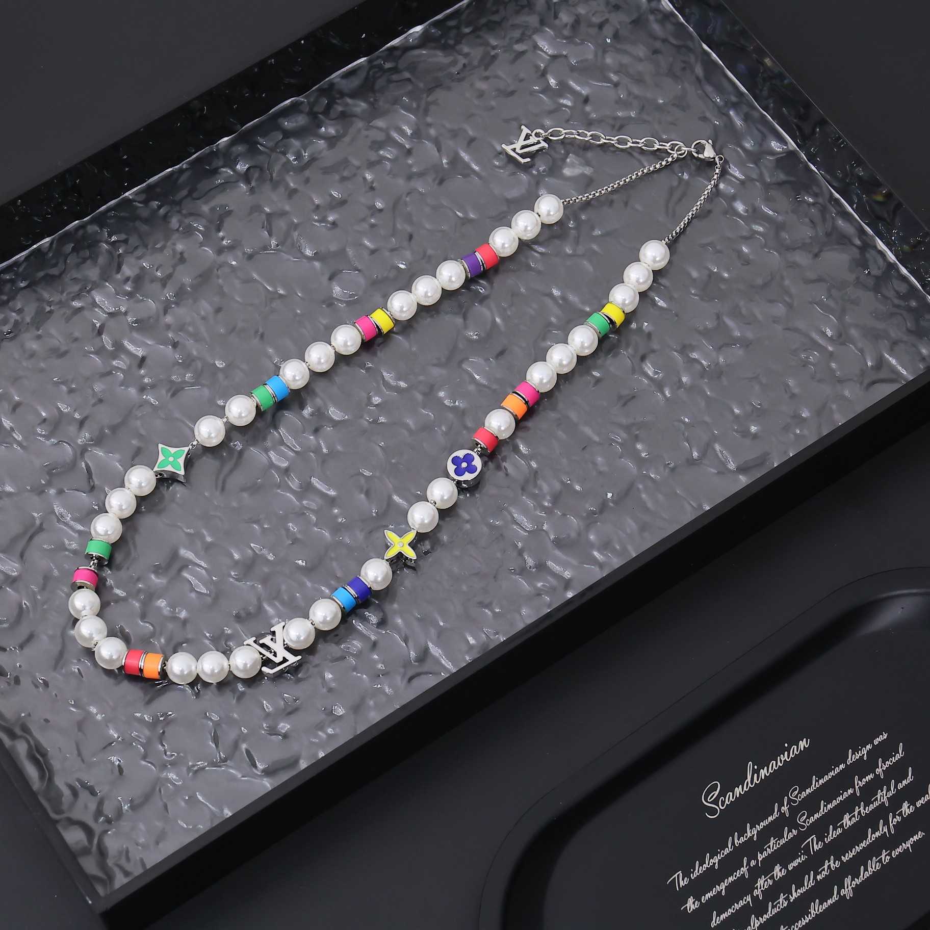 Louis Vuitton MNG Pearls Party Necklace   M01500 - FashionPlug
