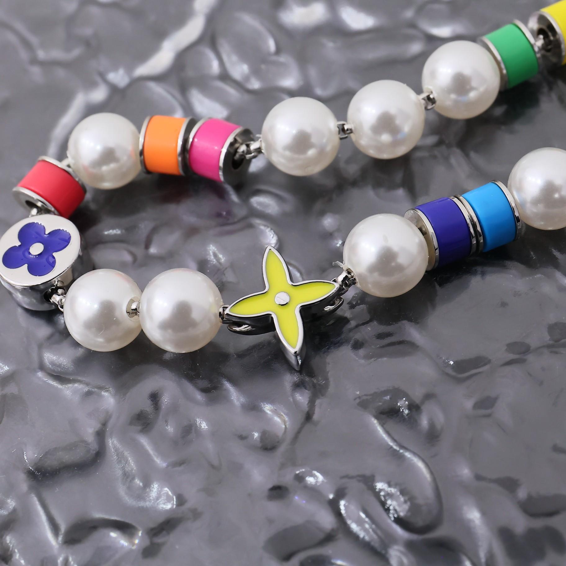 Louis Vuitton MNG Pearls Party Necklace   M01500 - FashionPlug