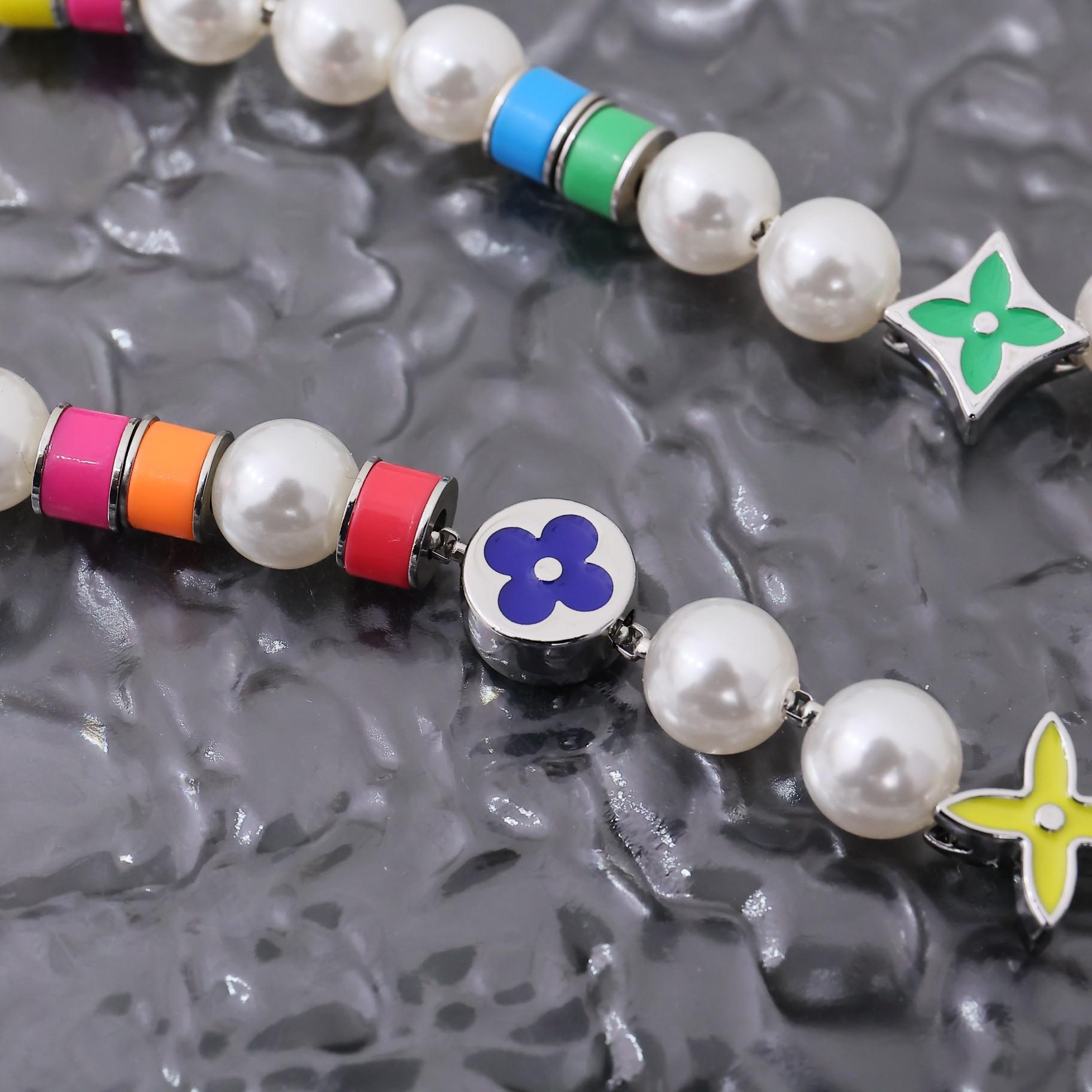 Louis Vuitton MNG Pearls Party Necklace   M01500 - FashionPlug