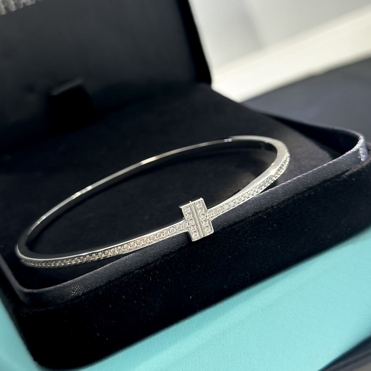 Tiffany & Co. 18K White Gold T Hinged Wire Bangle Bracelet - FashionPlug