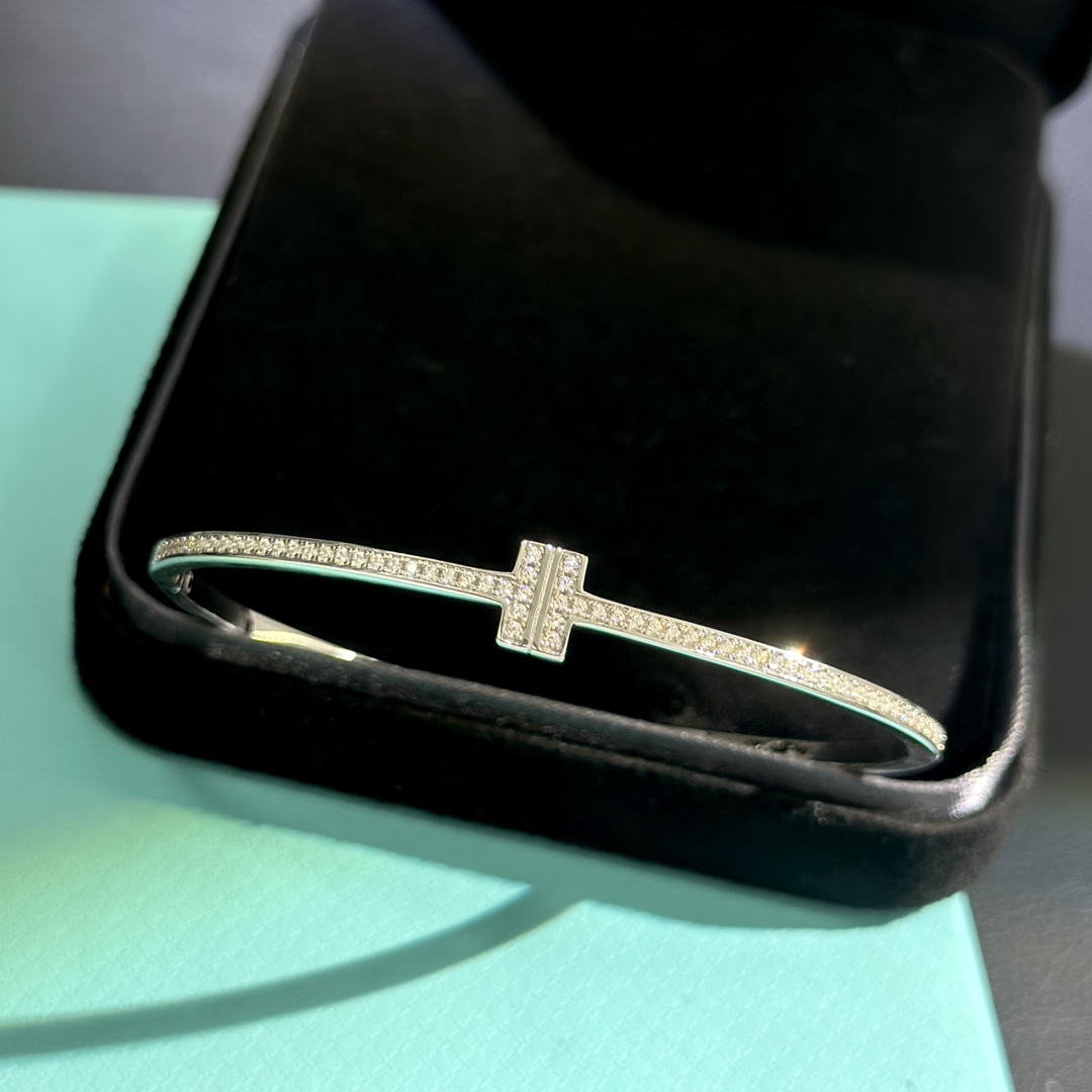 Tiffany & Co. 18K White Gold T Hinged Wire Bangle Bracelet - FashionPlug