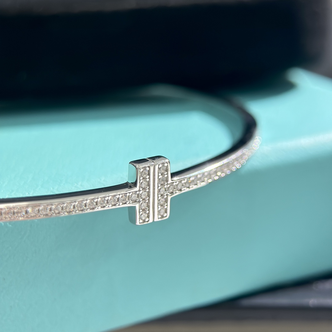 Tiffany & Co. 18K White Gold T Hinged Wire Bangle Bracelet - FashionPlug
