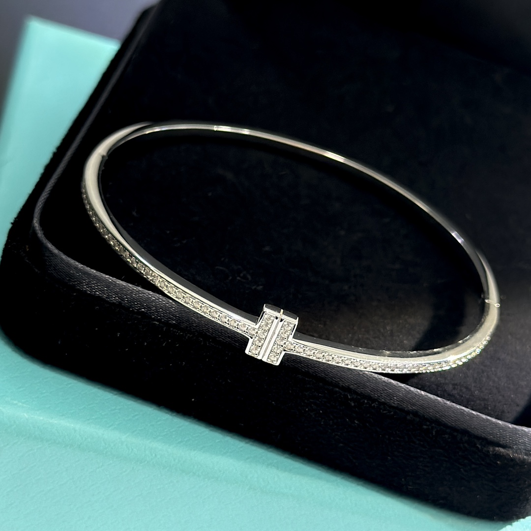 Tiffany & Co. 18K White Gold T Hinged Wire Bangle Bracelet - FashionPlug