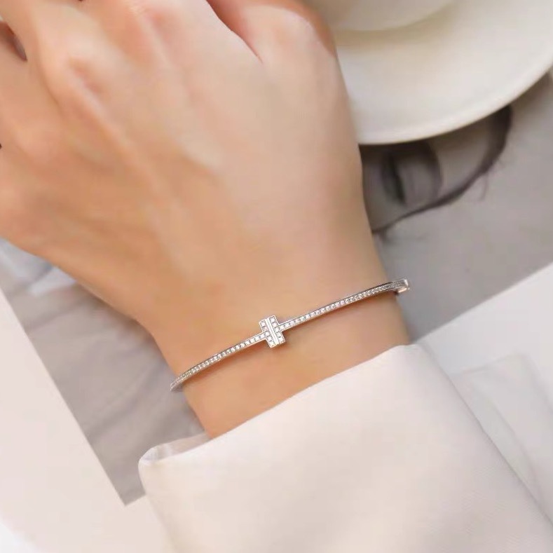 Tiffany & Co. 18K White Gold T Hinged Wire Bangle Bracelet - FashionPlug