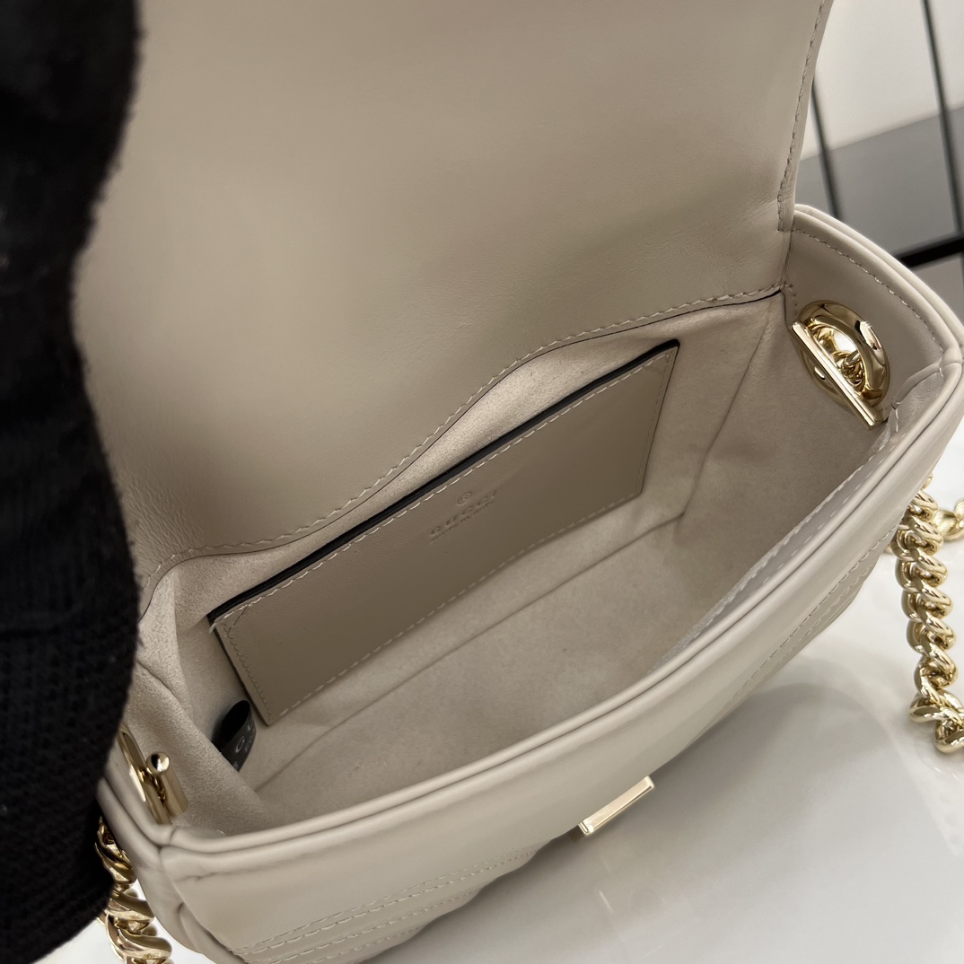 Gucci GG Marmont Mini Top Handle Bag - FashionPlug