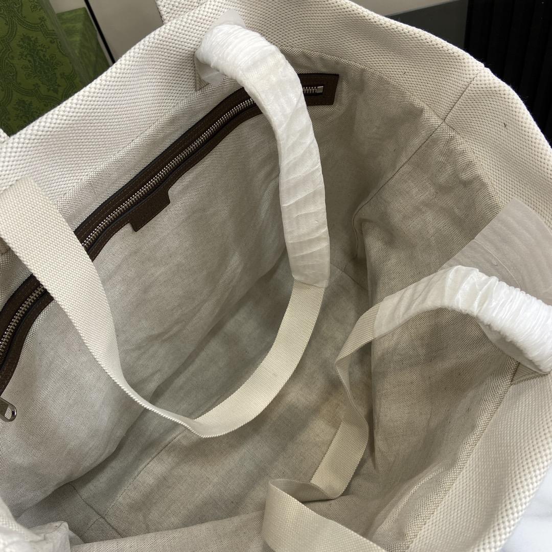 Gucci Canvas Tote Bag With Embossed Detail  - FashionPlug