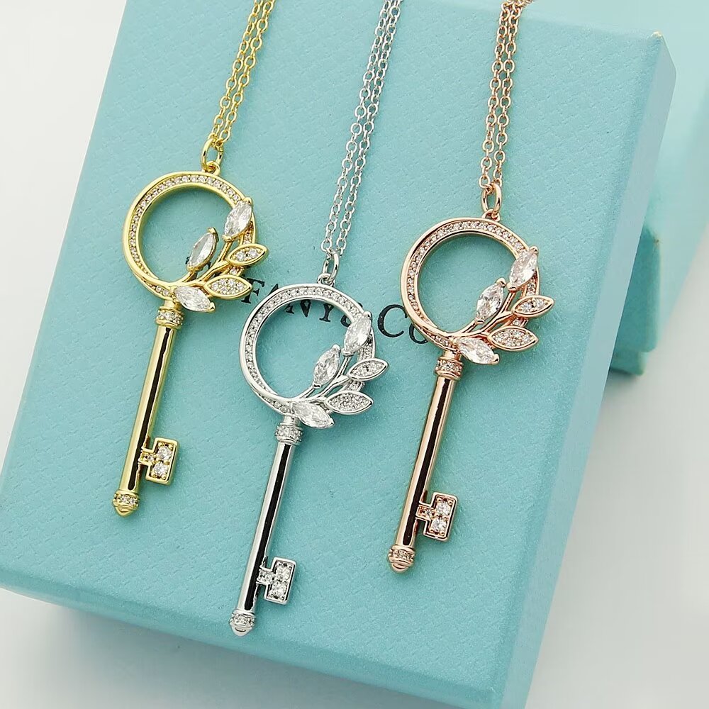 Tiffany & Co.  Diamond Vine Circle Key In Platinum - FashionPlug