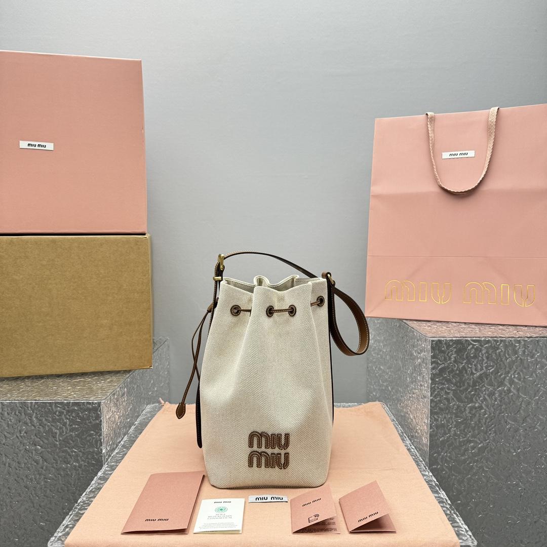 Miu Miu Canvas And Leather Bucket Bag - FashionPlug
