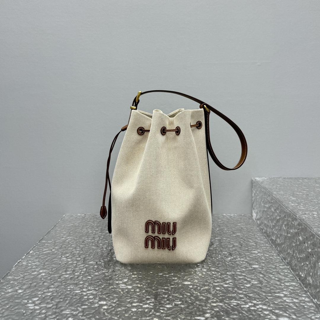 Miu Miu Canvas And Leather Bucket Bag - FashionPlug
