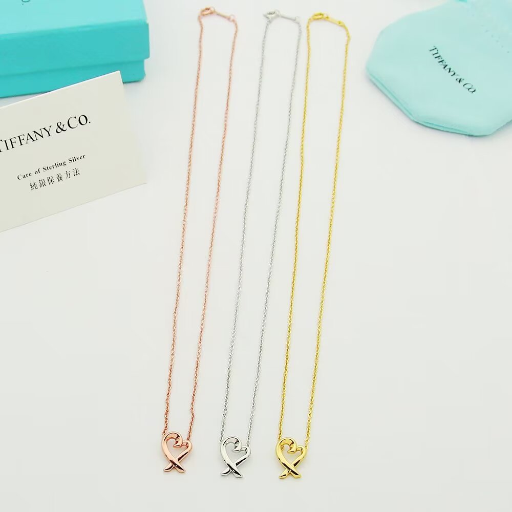 Tiffany & Co. Paloma Picasso Loving Heart Pendant - FashionPlug