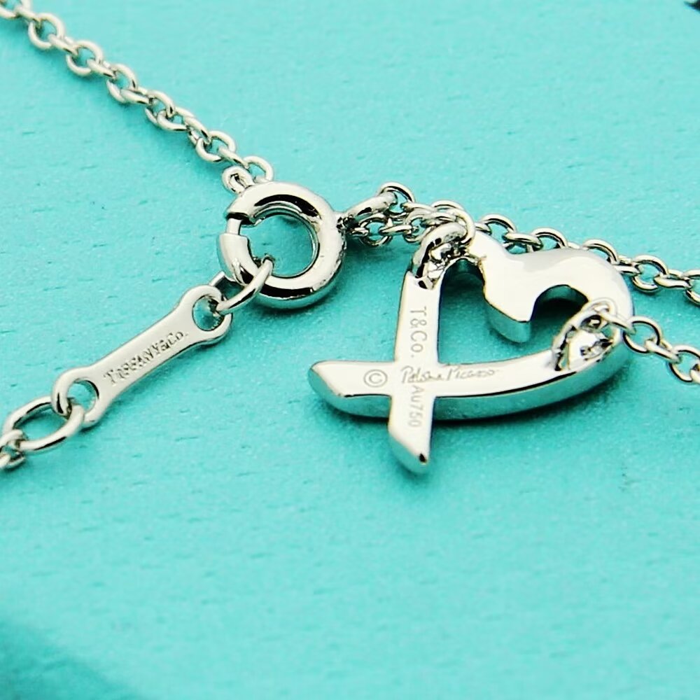 Tiffany & Co. Paloma Picasso Loving Heart Pendant - FashionPlug