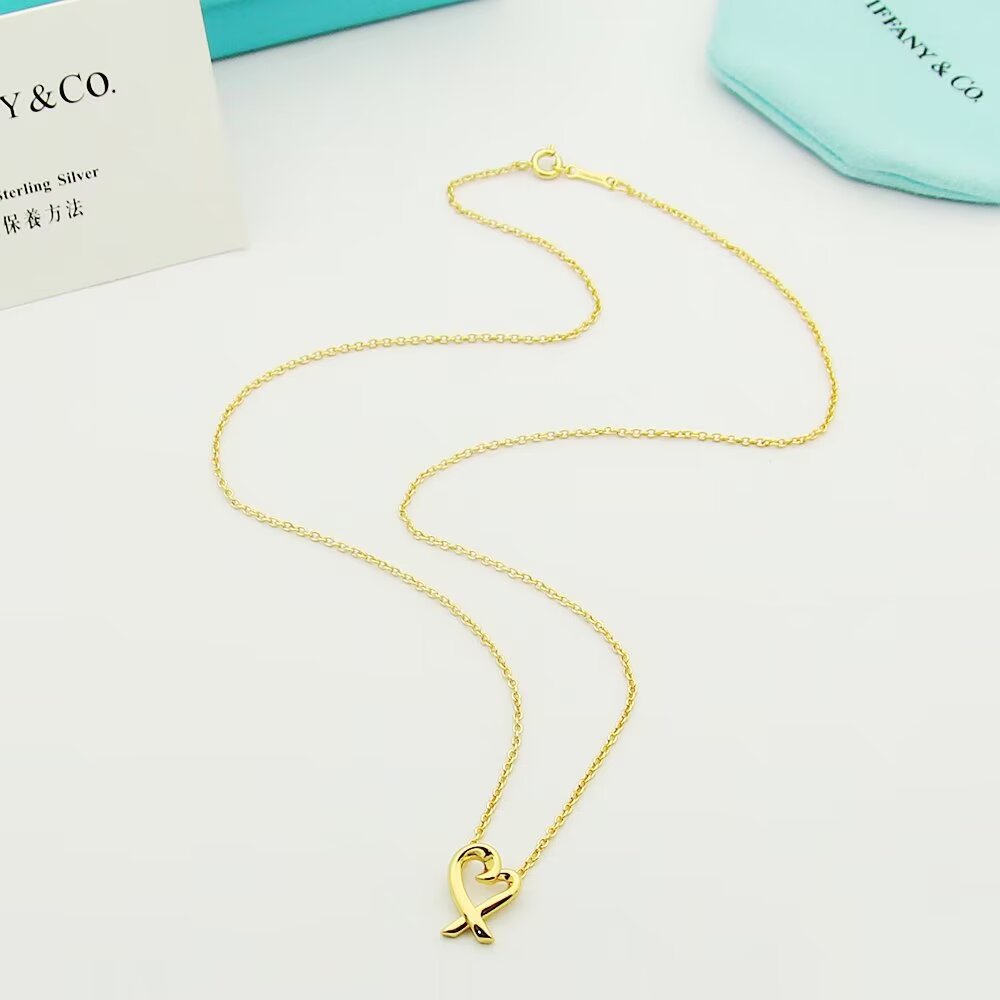 Tiffany & Co. Paloma Picasso Loving Heart Pendant - FashionPlug