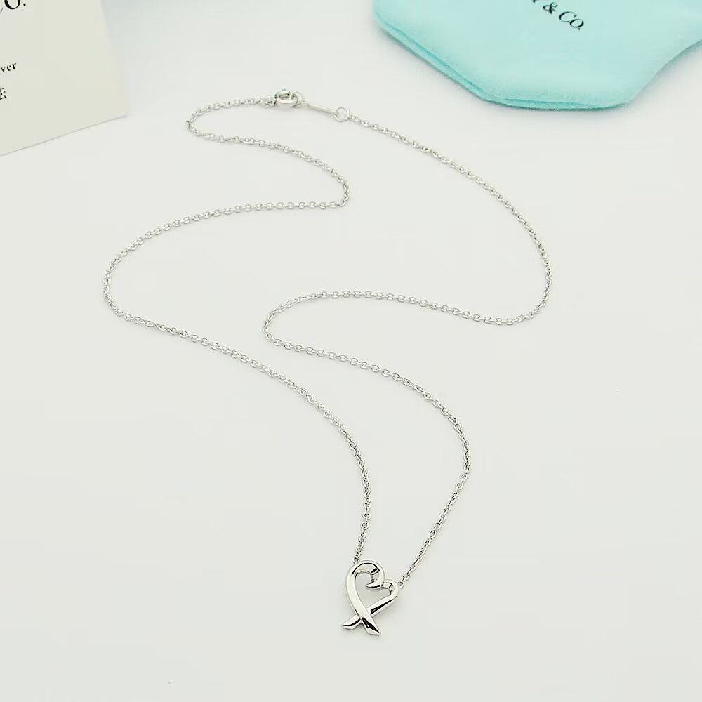 Tiffany & Co. Paloma Picasso Loving Heart Pendant - FashionPlug