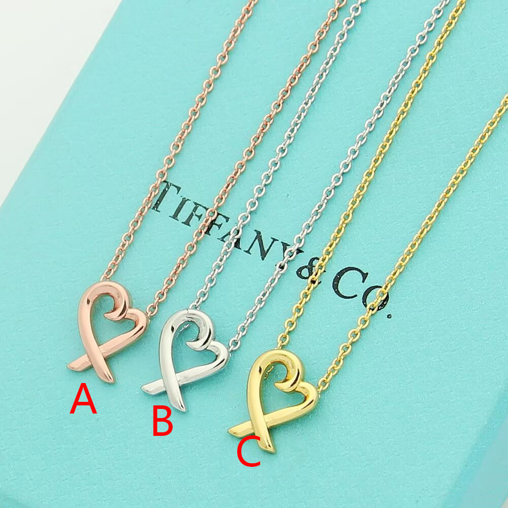 Tiffany & Co. Paloma Picasso Loving Heart Pendant - FashionPlug