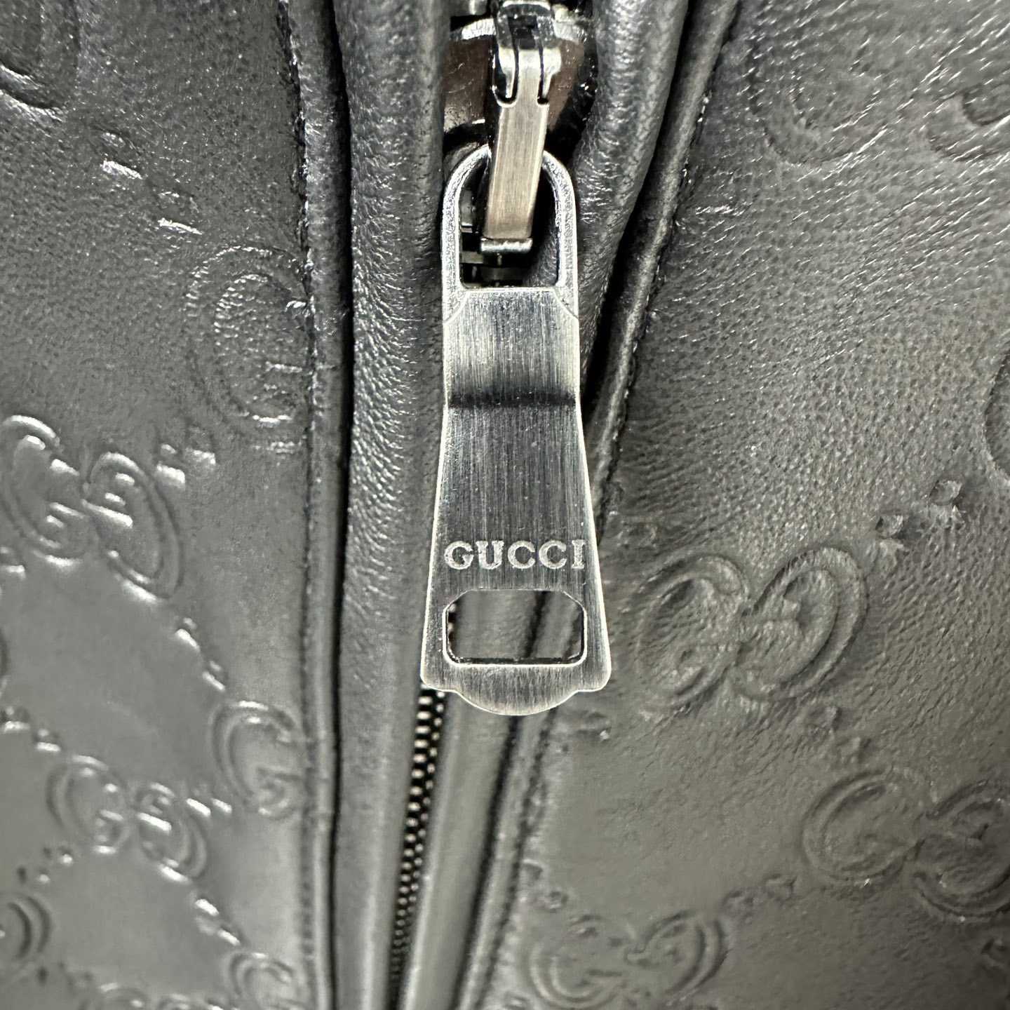 Gucci Embossed GG Leather Bomber Jacket  - FashionPlug