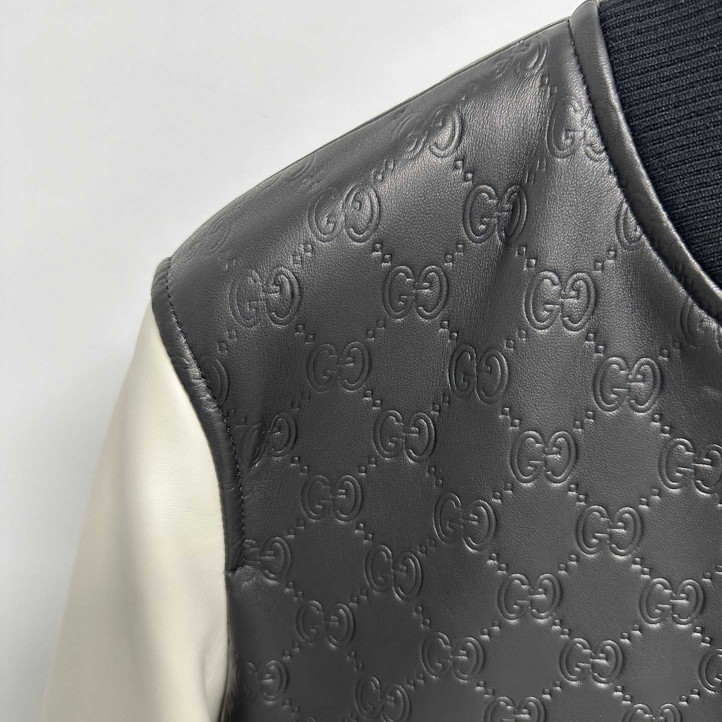 Gucci Embossed GG Leather Bomber Jacket  - FashionPlug
