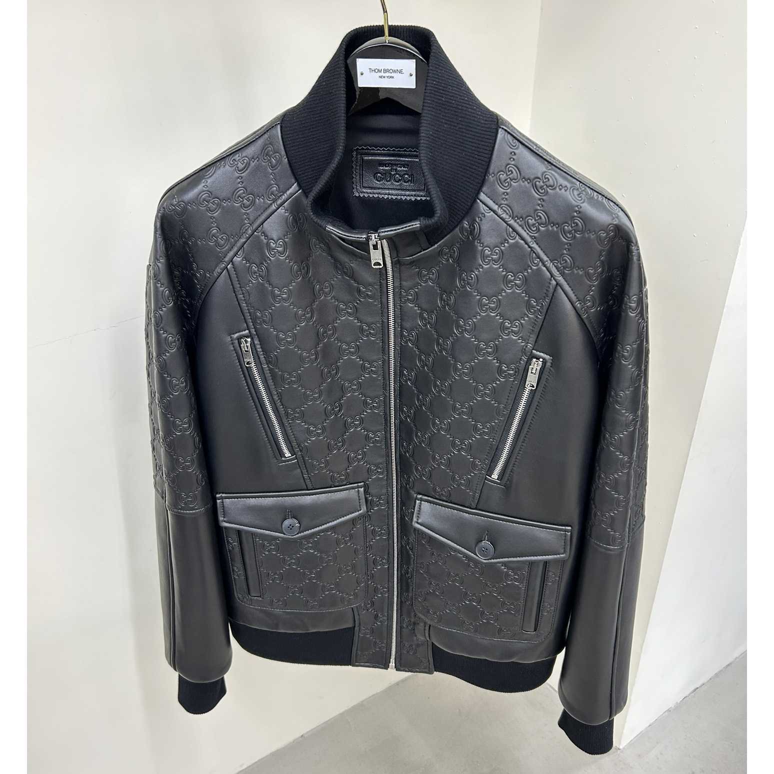 Gucci GG Embossed Bomber Jacket In Black - FashionPlug