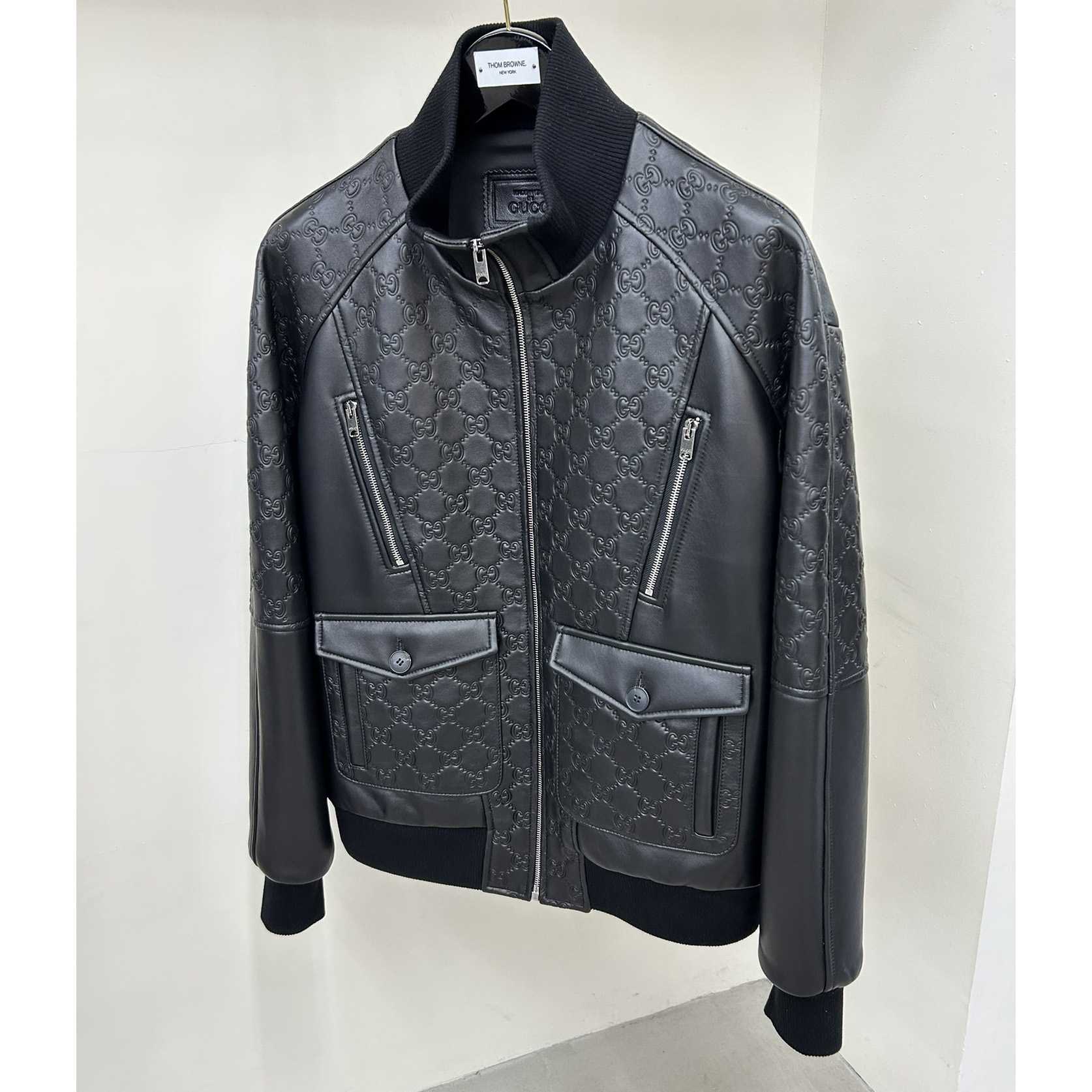 Gucci GG Embossed Bomber Jacket In Black - FashionPlug