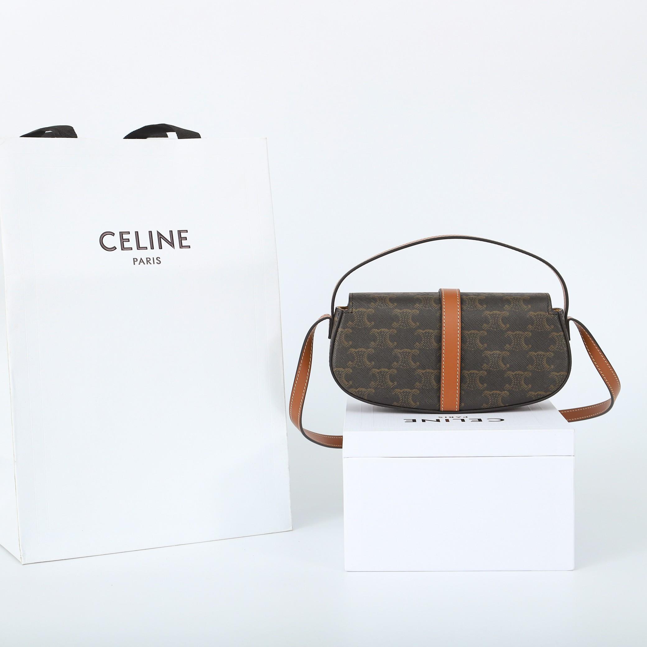 Celine Clutch On Strap Tabou In Triomphe Canvas And Calfskin - FashionPlug