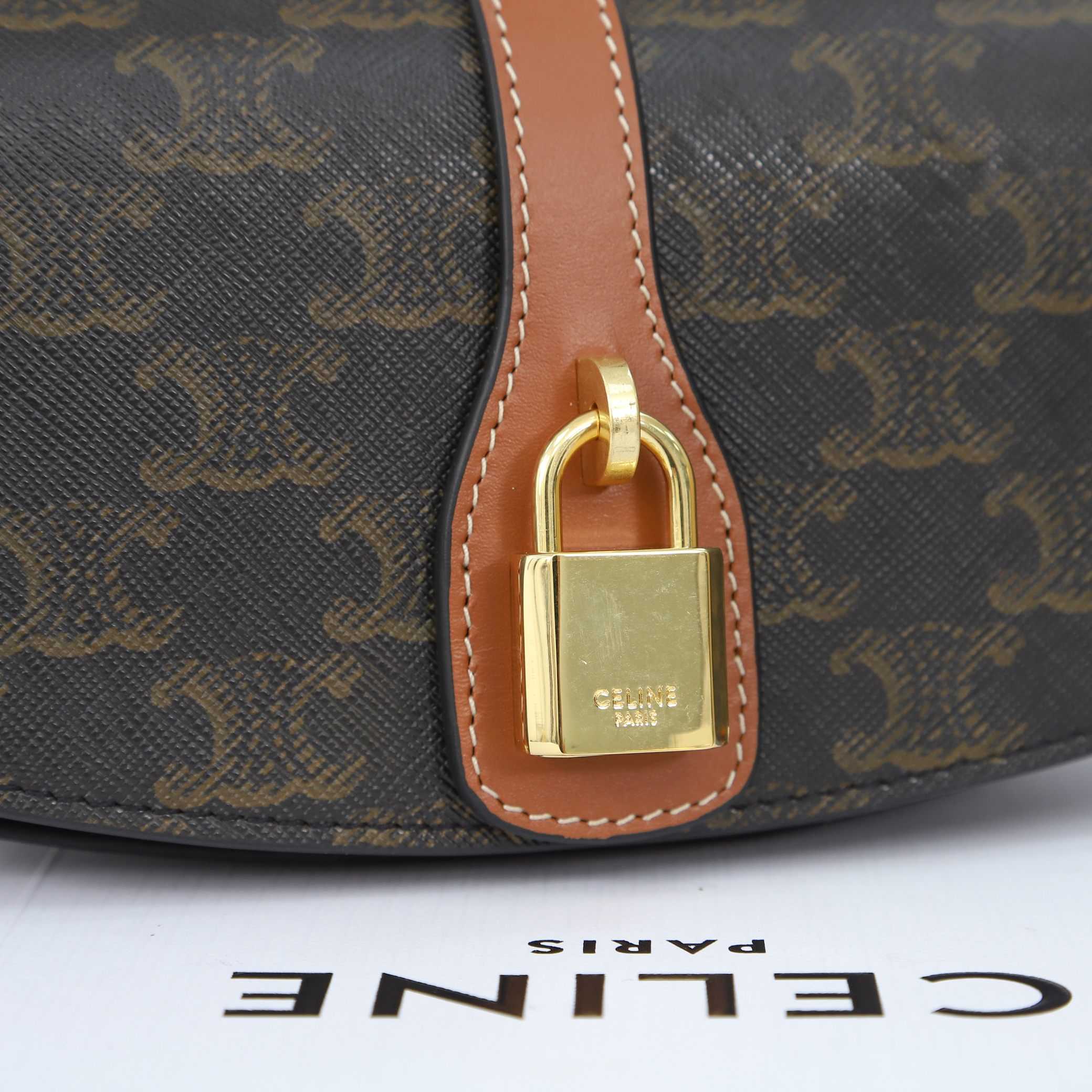 Celine Clutch On Strap Tabou In Triomphe Canvas And Calfskin - FashionPlug