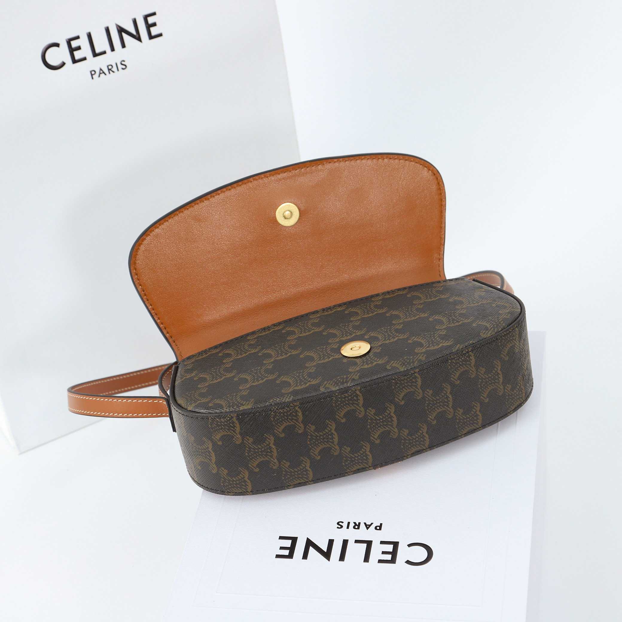 Celine Clutch On Strap Tabou In Triomphe Canvas And Calfskin - FashionPlug