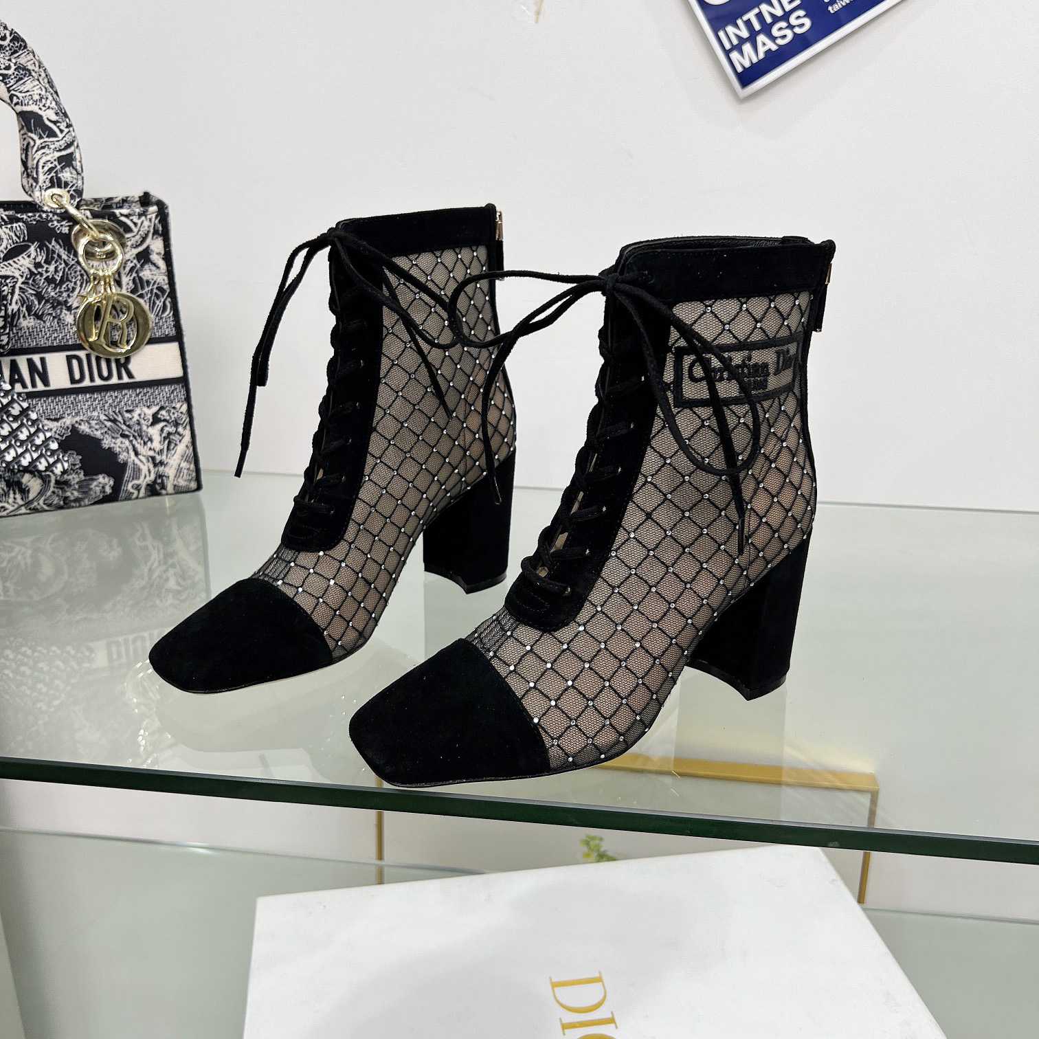 Dior Naughtily-D Heeled Ankle Boot - FashionPlug