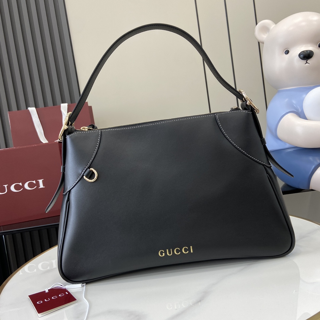 Gucci GG Emblem Medium Shoulder Bag - FashionPlug