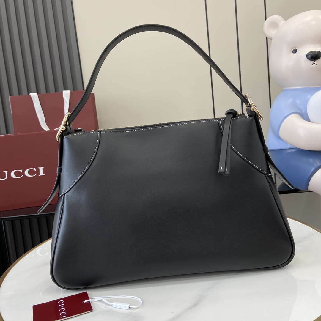 Gucci GG Emblem Medium Shoulder Bag - FashionPlug