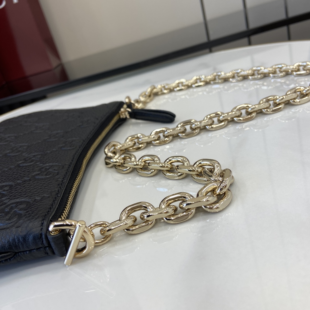 Gucci GG Emblem Super Mini Bag - FashionPlug