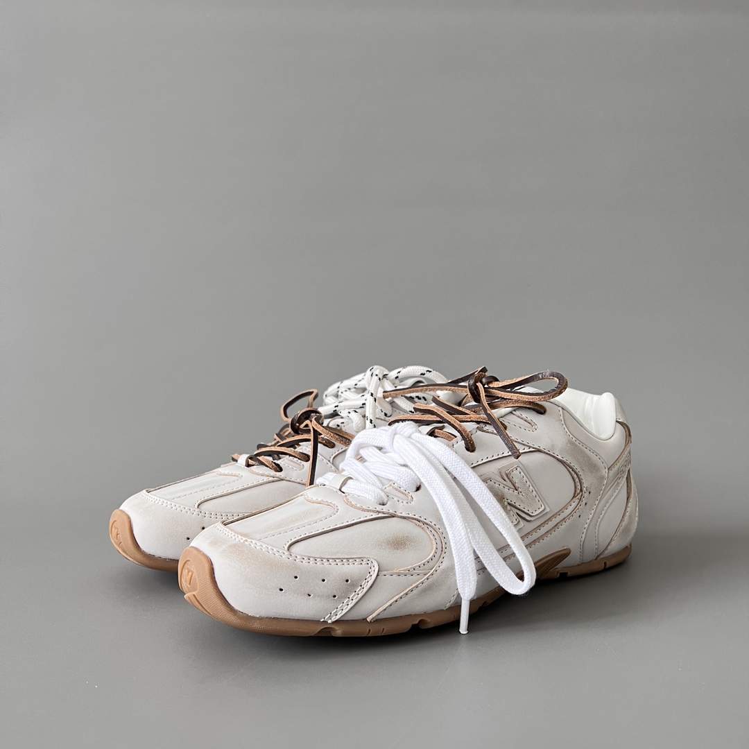 Miu Miu x New Balance 530 Sneakers - FashionPlug